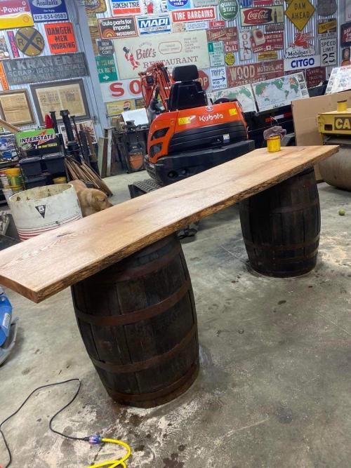 8 foot red oak bar includes 2 whiskey barrels